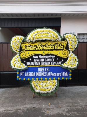 Papan Bunga Duka di Kakaskasen Dua